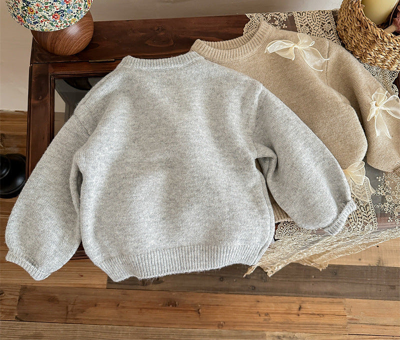 Sweater with Elegant Bows