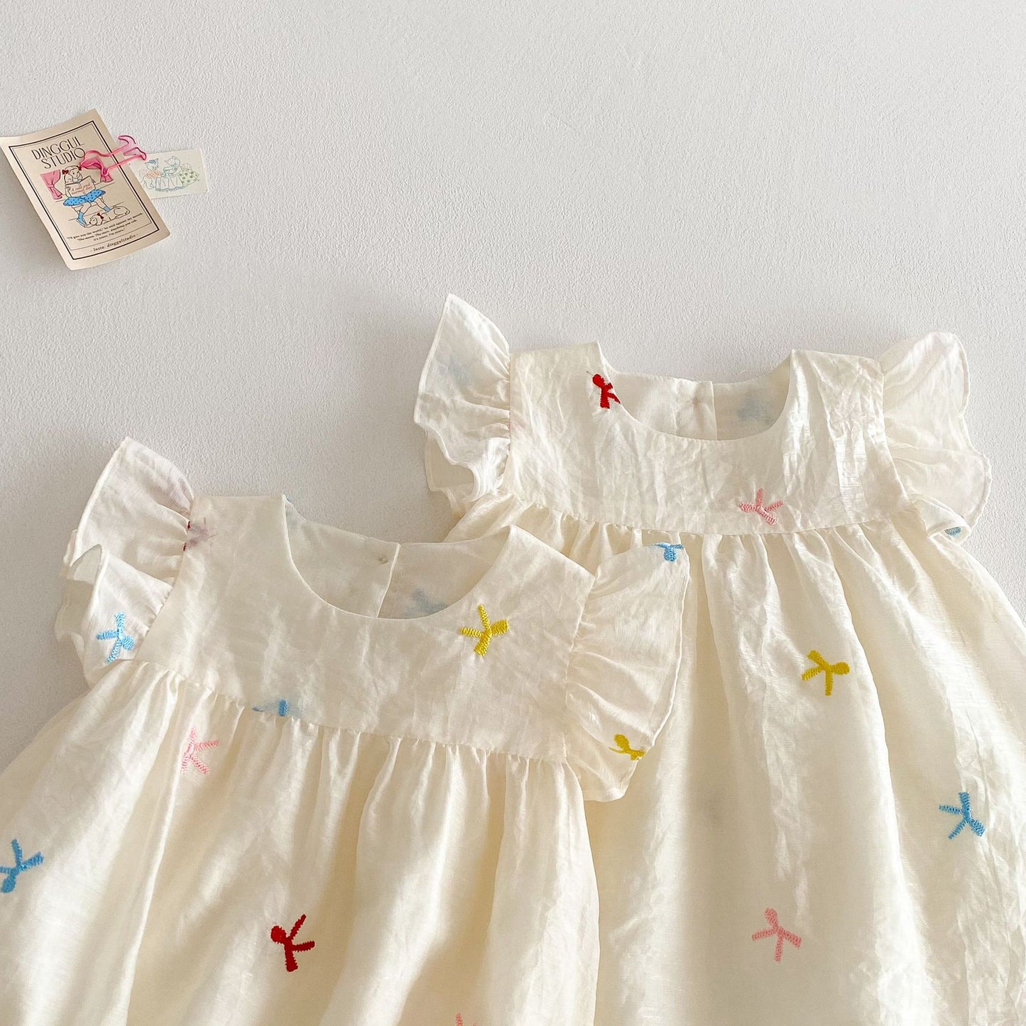 Confetti Bows Flutter Dress β Ivory Multi
