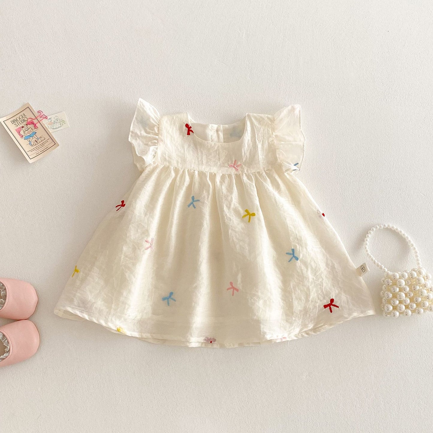 Confetti Bows Flutter Dress β Ivory Multi