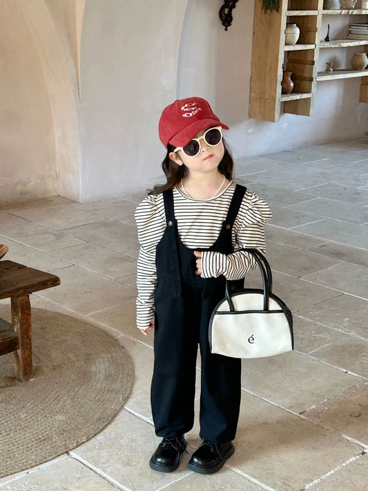 Black overall and stripe shirt