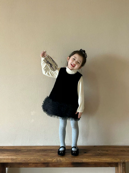 Black ruffle dress with high collar shirt