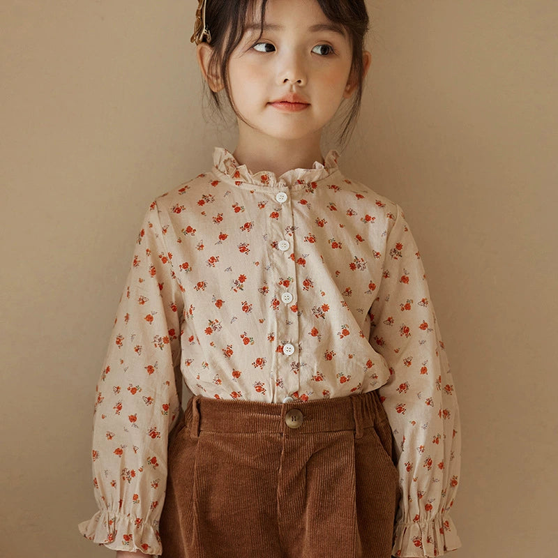Floral shirt + brown shorts