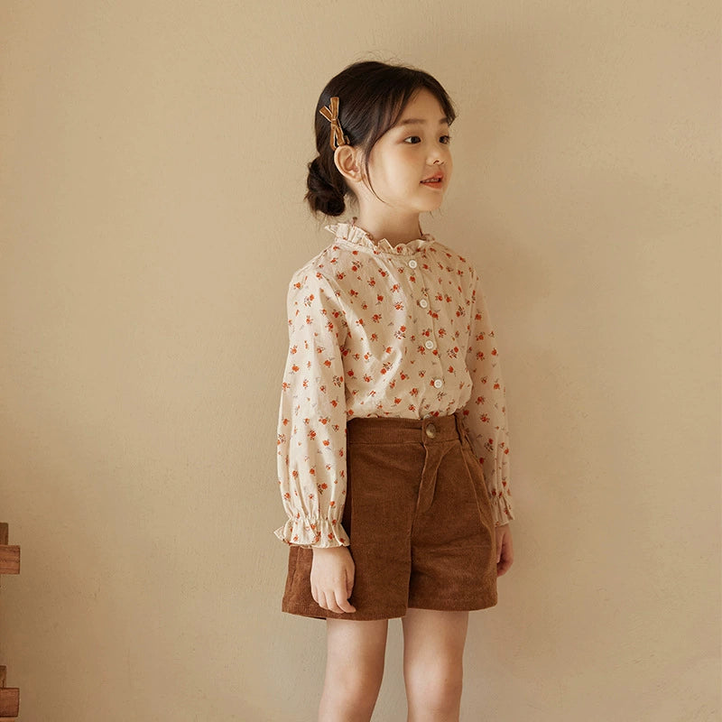 Floral shirt + brown shorts