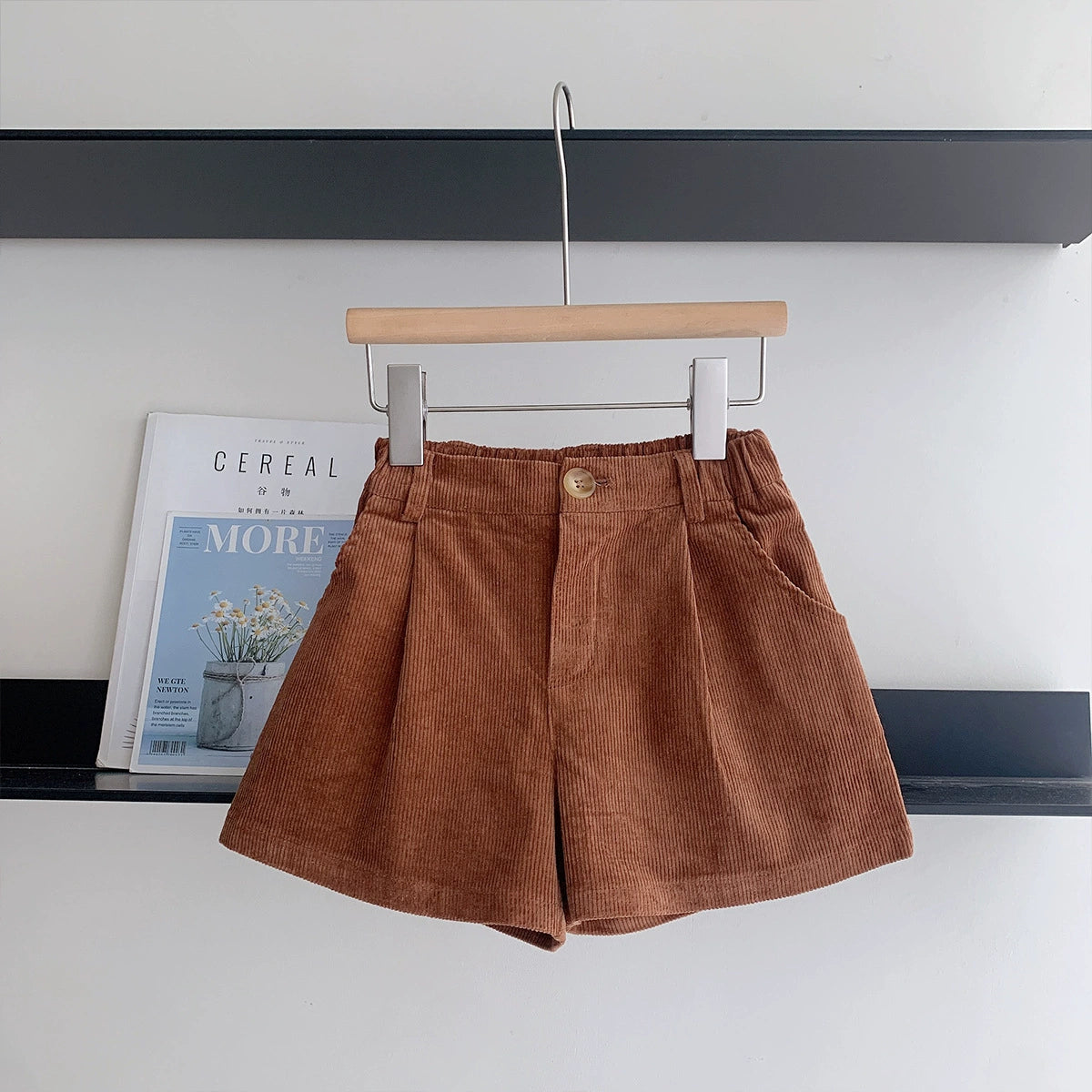 Floral shirt + brown shorts