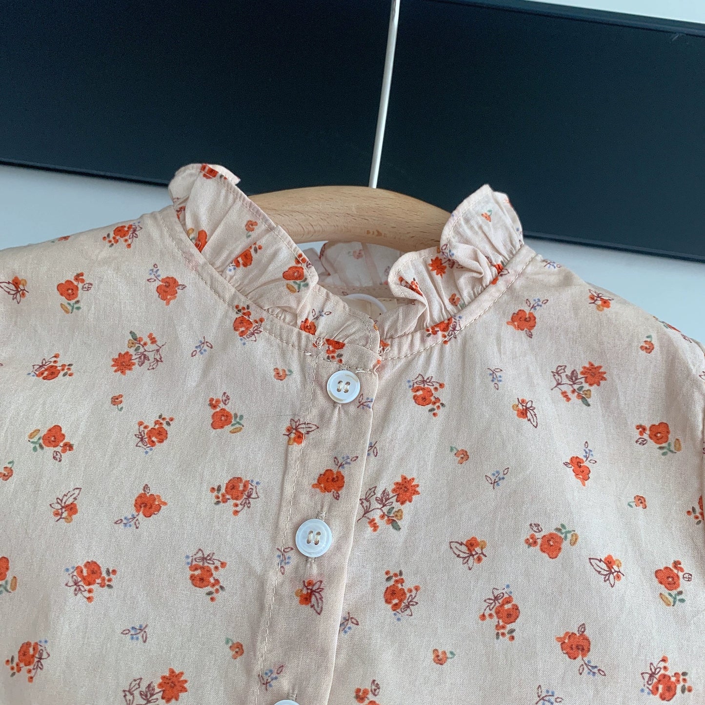 Floral shirt + brown shorts