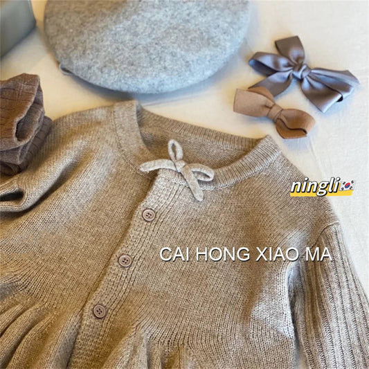 Neutral Bow Peplum Knit Cardigan